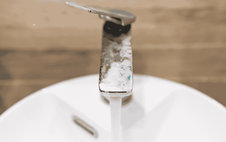 Tap water with limescale residue